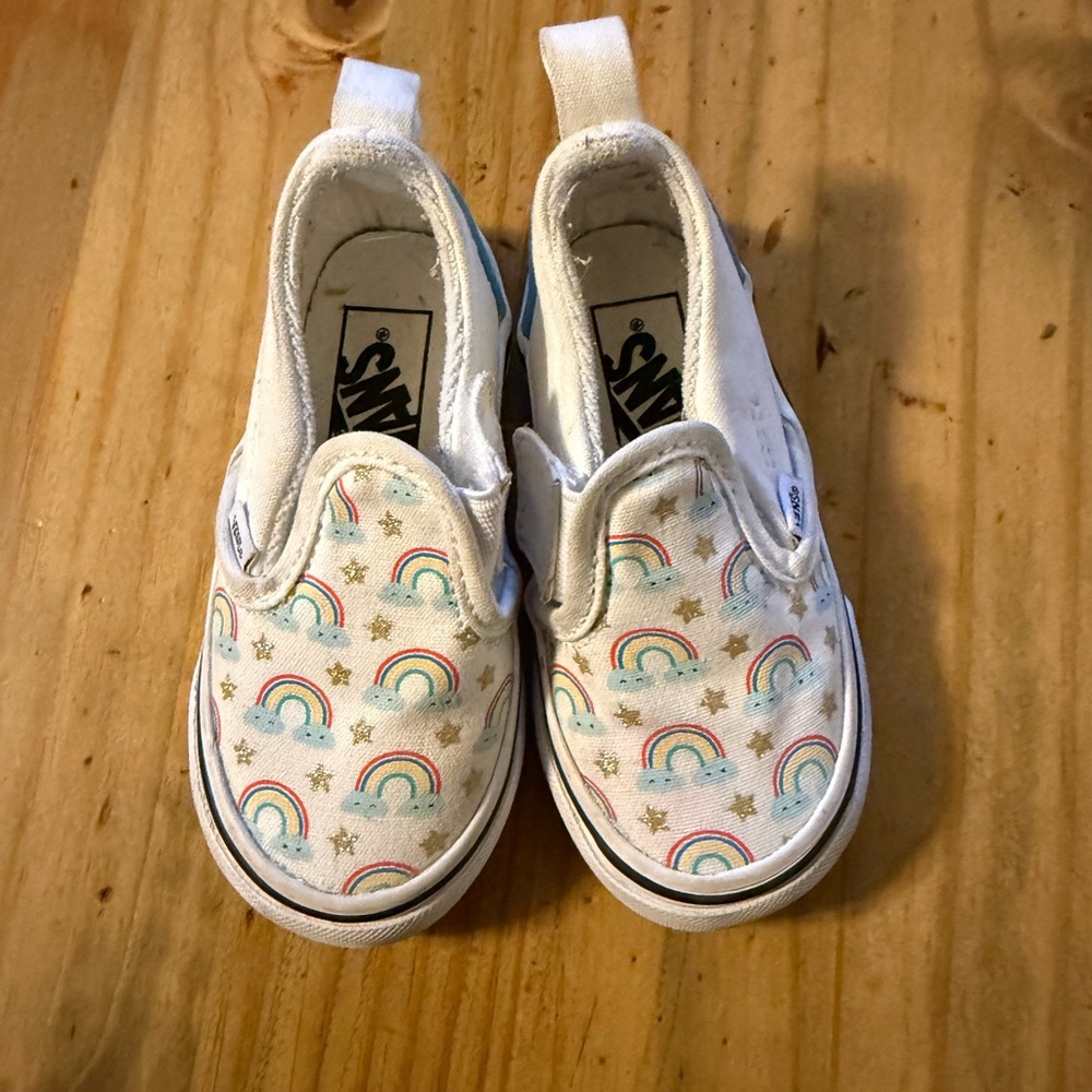 Vans Toddler Slip-On Sneakers in White with Rainbow and Gold Star Print